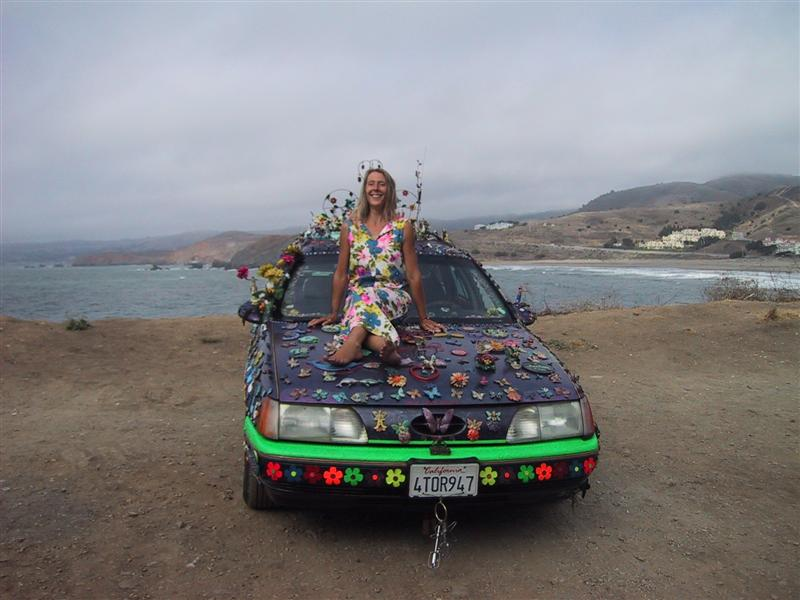 Illustration for article titled Groovalicious Purple Princess Of Peace Art Car Falls On Hard Times, Faces Crusher